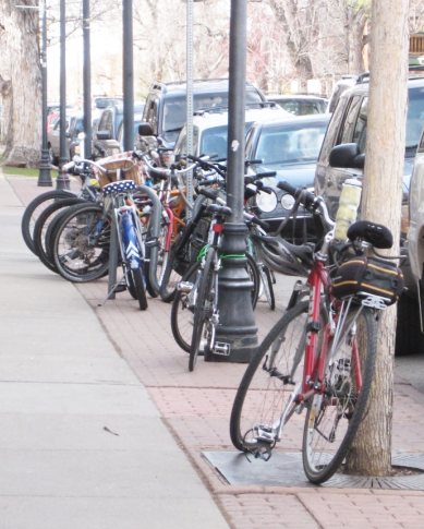 Parking for bikes doesn't have nearly as much play as parking for cars. Hopefully free racks will change that. (Image: DPW)
