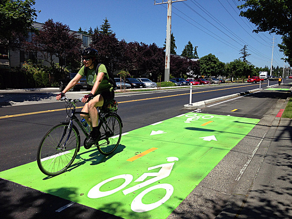 Modular curbs and bollards protect a bike lane in Seattle. Image: People for Bikes via WalkDenver