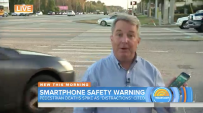The Today Show's Kerry Sanders stood in the middle of an enormous intersection in Orlando and blamed distracted pedestrians for the rise in pedestrian deaths.