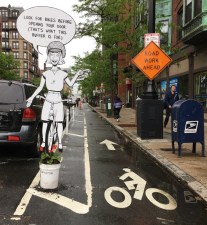 Comic characters in Boston's bike lanes remind drivers (and the mayor) that more can be done to improve safety. Photo: Jonathan Fertig