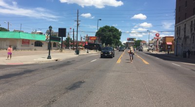 On Colfax, where signalized intersections are few and far between, people cross where it's convenient for them. Photo: David Sachs