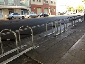 Records from Seattle DOT confirm that these bike racks were installed under a viaduct to deter camping by homeless people. Photo:  Dongho Chang