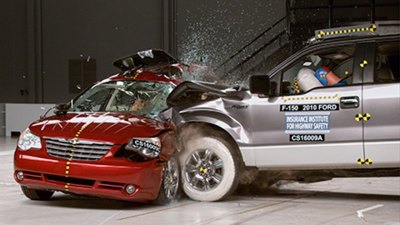 This lab crash simulates a 2012 red-light-running crash in Yuma, Arizona. The driver was severely injured. Photo: IIHS