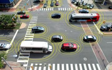 This is a fantasy of what "connected" cars and buses would do. Car makers say new technology will make their vehicles safer. Safety experts are unsure. Photo: National Traffic Highway Safety Administration