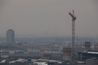 Denver refinery through brown cloud of pollution