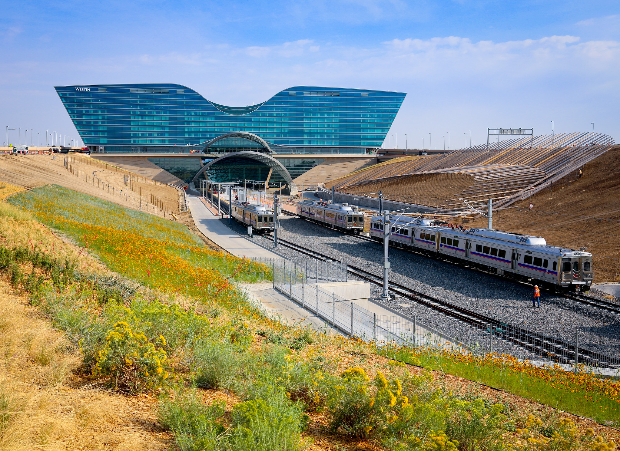 RTD A Line trains approach the airport transit center. Image: Denver International Airport