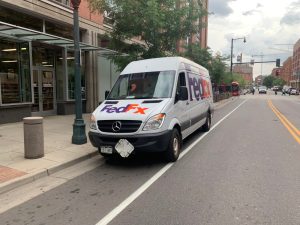 A FedEx vehicle parked in a bike lane on Wynkoop Street between 15th & 16th Streets on Aug. 8. Photo: Andy Bosselman