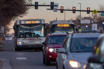 RTD buses wait in traffic on East Colfax Ave. on Dec. 12. Photo: Andy Bosselman