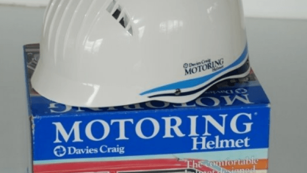 Photo motoring helmet on top of box