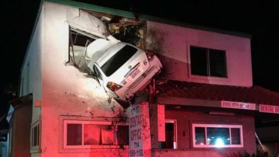 Photo of car crashed into a building