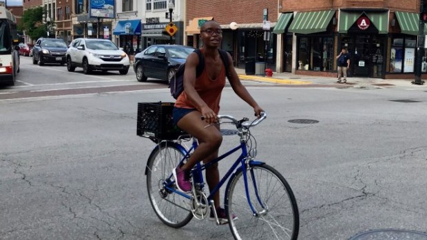 Photo of Courtney Cobbs riding a bike