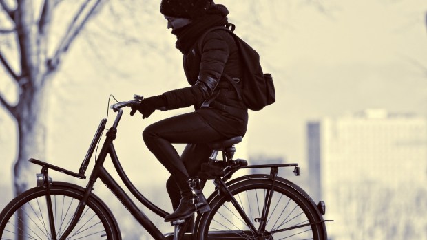Person riding a bike in winter