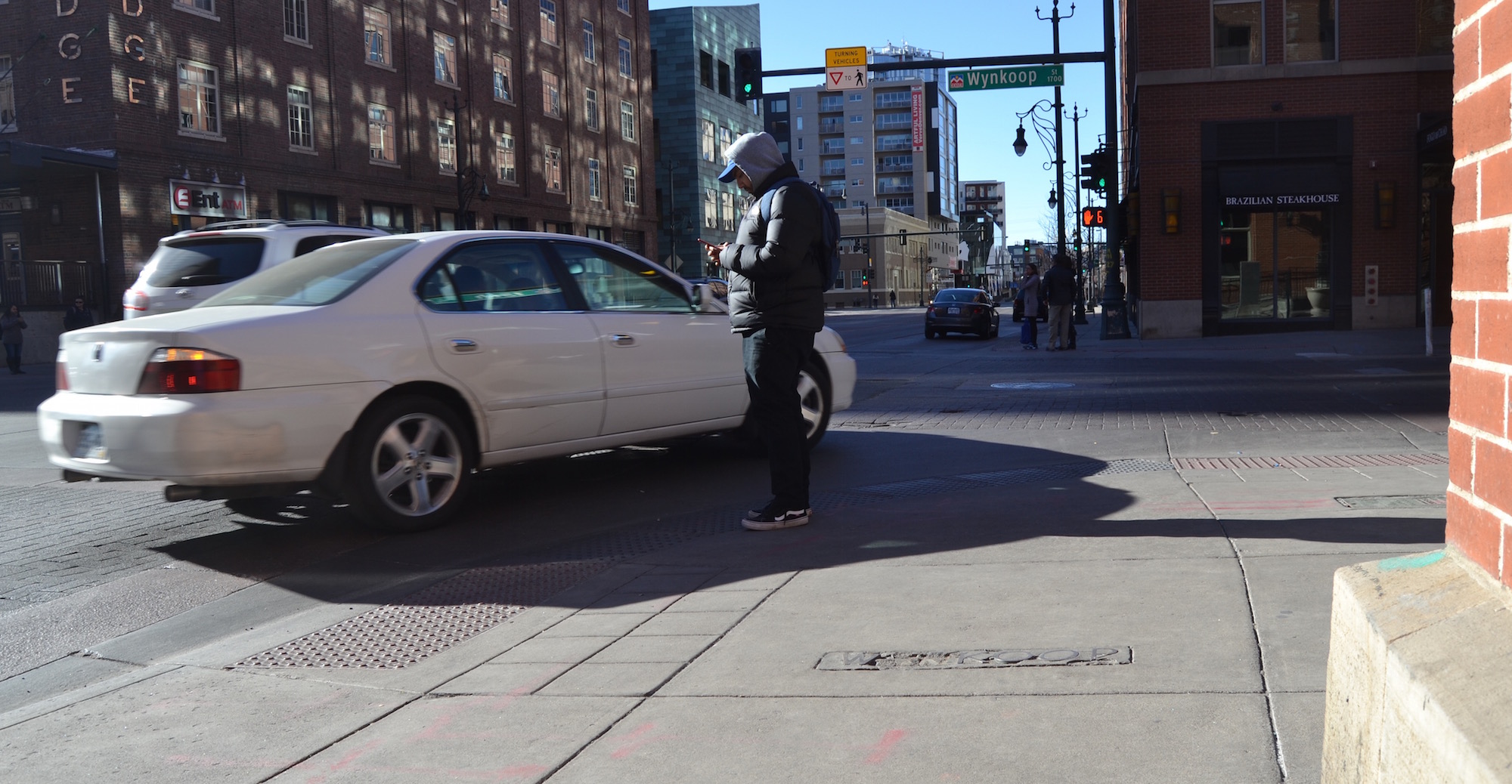 Why Does Downtown Denver Have Street Corners That Drivers Can Roll Right Over?