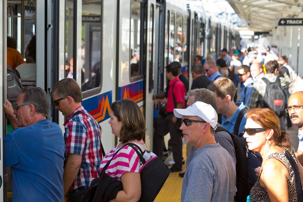 Downtown Denver Workers Walk, Bike and Ride Transit More